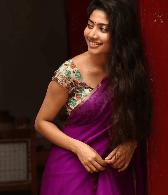 Purple Saree with Contrast Blouse with floral prints worn by Sai Pallavi