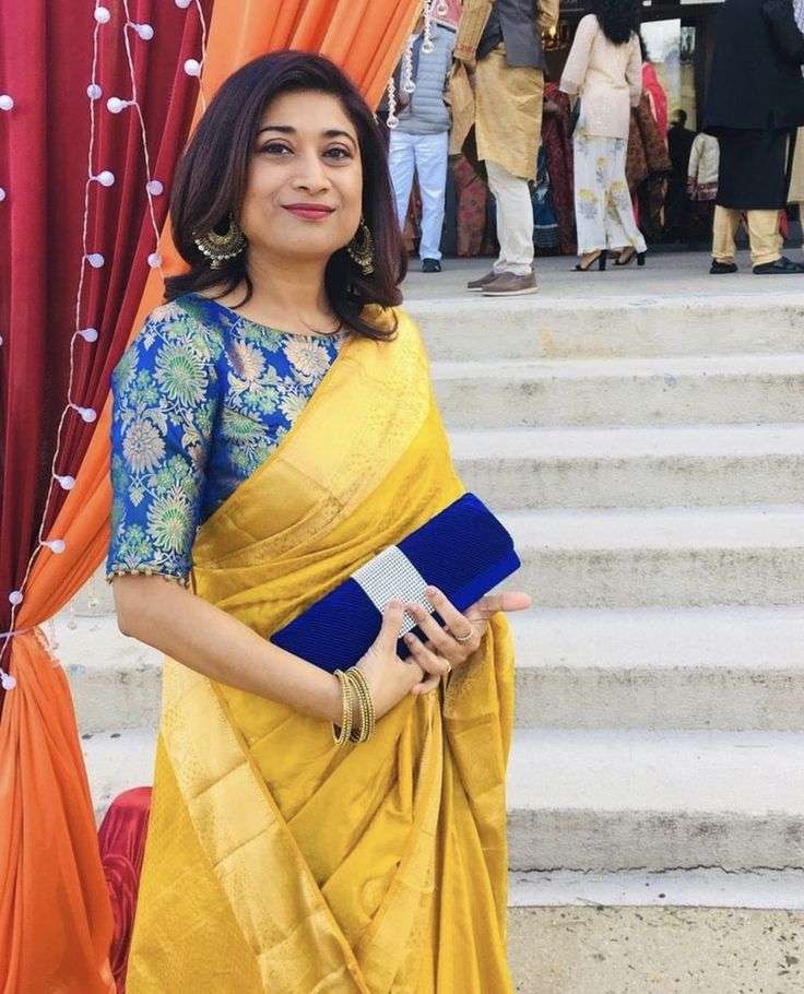 Plain Yellow Silk Saree with contrast designer blue blouse