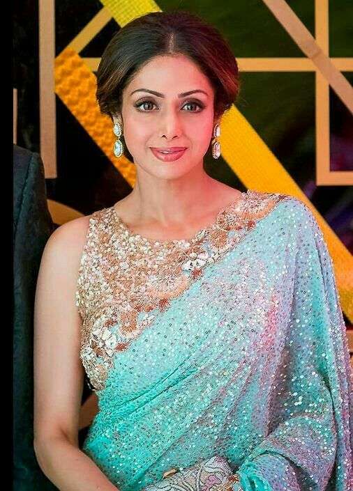 Blue Saree with a Contrast Blouse with matching makeup & jewellery