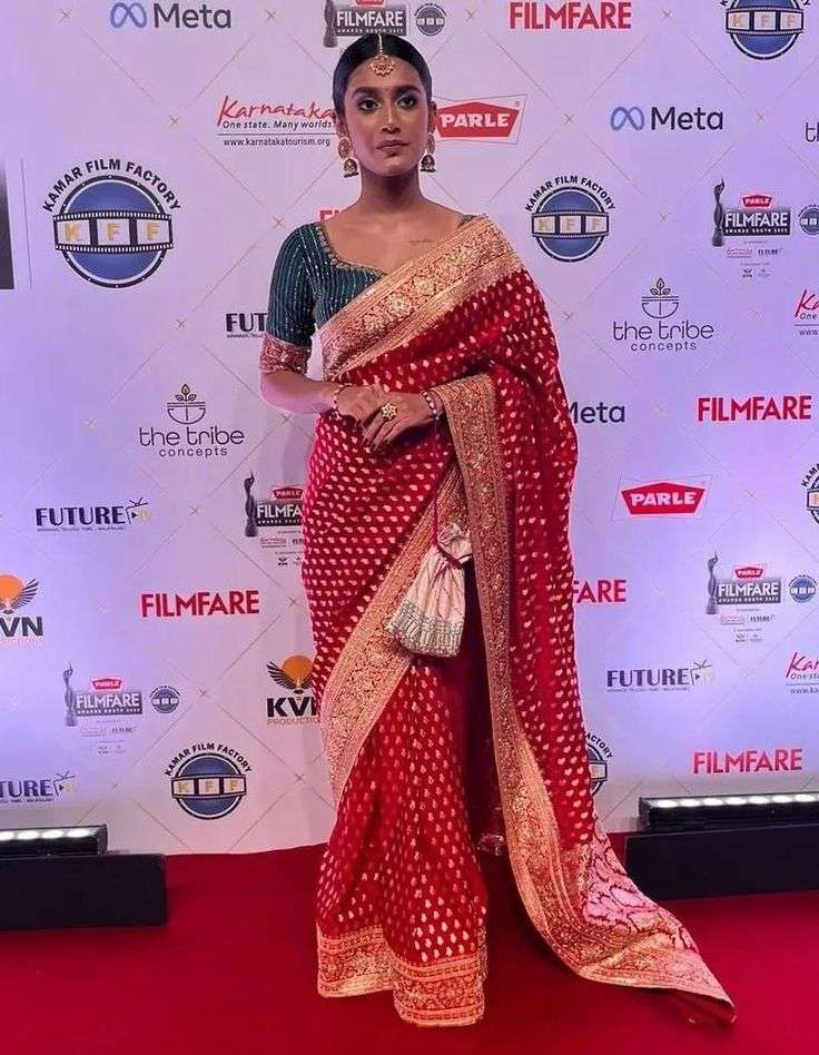 Red Saree with Contrast Blouse worn by celebrity