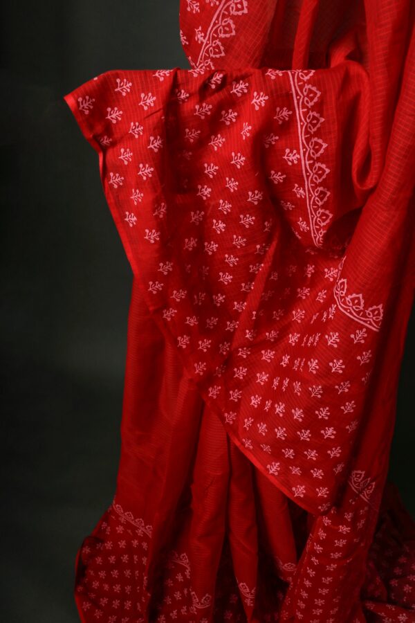 1000138230_541855da-9ff5-445c-8022-7916bc6283e1 Red Printed Kota Cotton Sarees