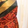 IMG-1454 Autumn Elegance Orange and Black Printed Kanchipuram Silk Saree