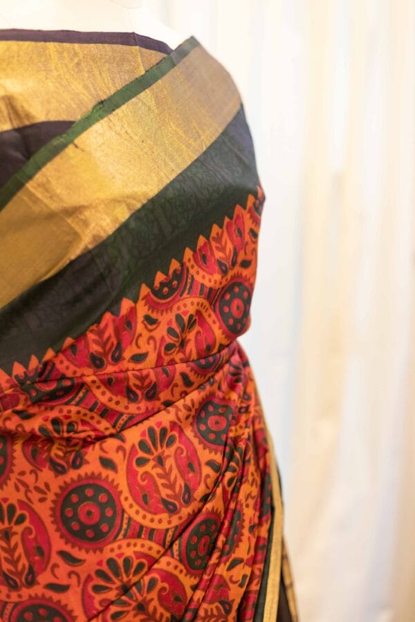 IMG-1454 Autumn Elegance Orange and Black Printed Kanchipuram Silk Saree