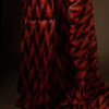rn-image_picker_lib_temp_162dce68-4213-4a22-9dcd-7dfba73b8364 Sunset Noir Orange and Black Pure Organza Silk Saree