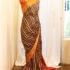 rn-image_picker_lib_temp_45763fe4-0dd0-4458-99b7-95b0109c8e0a Mystic Sunset Orange and Black Striped Printed Kanchipuram Silk Saree