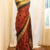 rn-image_picker_lib_temp_593b57f8-73fa-49d5-a67f-91341e315e36 Autumn Elegance Orange and Black Printed Kanchipuram Silk Saree