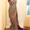 rn-image_picker_lib_temp_63ab299d-d765-477f-8a3e-fb6ec78dc663 Twilight Elegance Black and Purple Printed Kanchipuram Silk Saree