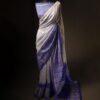rn-image_picker_lib_temp_7fb76b6c-529b-4497-9bcd-fd9a6d28e542 Uddup Breeze White and Blue Pure Dupion Silk Saree