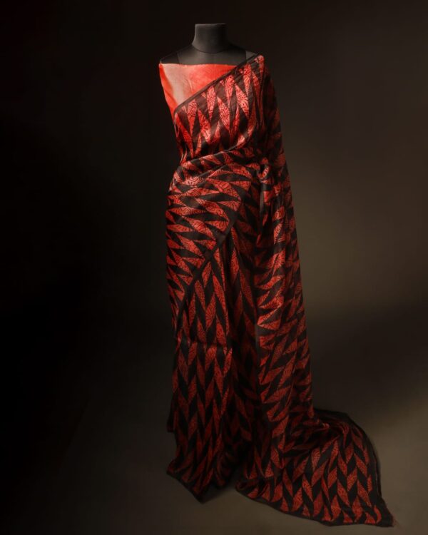 rn-image_picker_lib_temp_8aa734e7-e971-4589-a923-51956a17a260 Sunset Noir Orange and Black Pure Organza Silk Saree