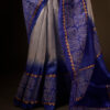 rn-image_picker_lib_temp_9f0c1fd3-217e-4811-8d57-b940e53a6dd5 Uddup Breeze White and Blue Pure Dupion Silk Saree