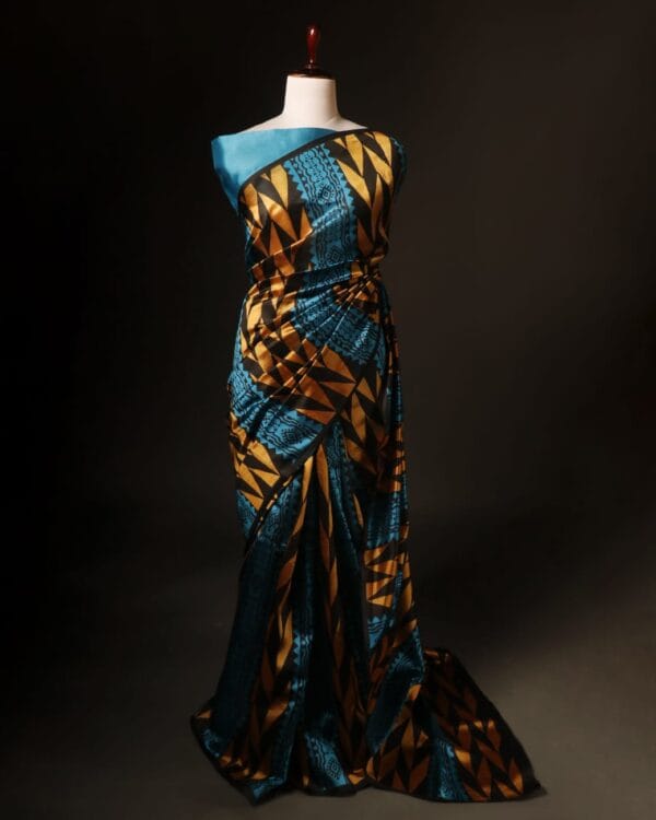 rn-image_picker_lib_temp_a71081e3-697d-4958-8a8a-1c7e5bb1ef06 Pure Hand block Printed Blue and yellow Raw Silk saree