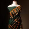 Harmony in Nature Green and Orange Handloom Silk Cotton Saree